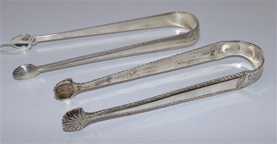 Two pairs of silver sugar tongs